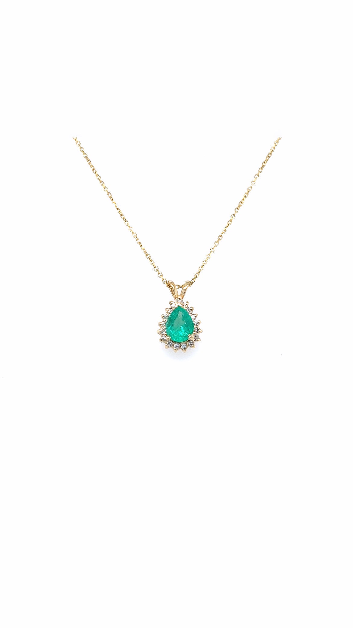 Emerald In Yellow Gold Halo